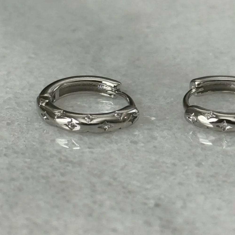 COPY - COPY - Sterling Silver Star Crystal Pave Hoop Earrings

Brand New - Picture 2 of 5